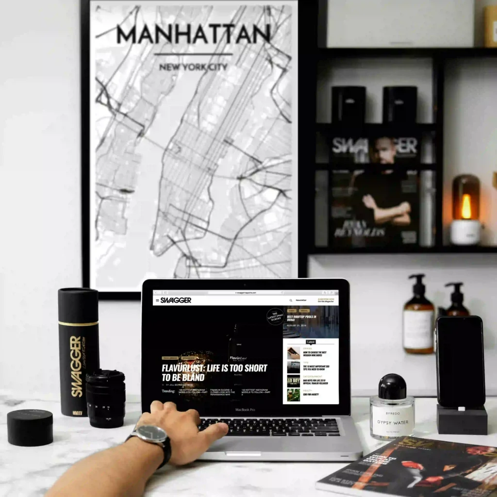 a workspace with laptop and other accessories Top Freelanace Digital Marketer In Kochi